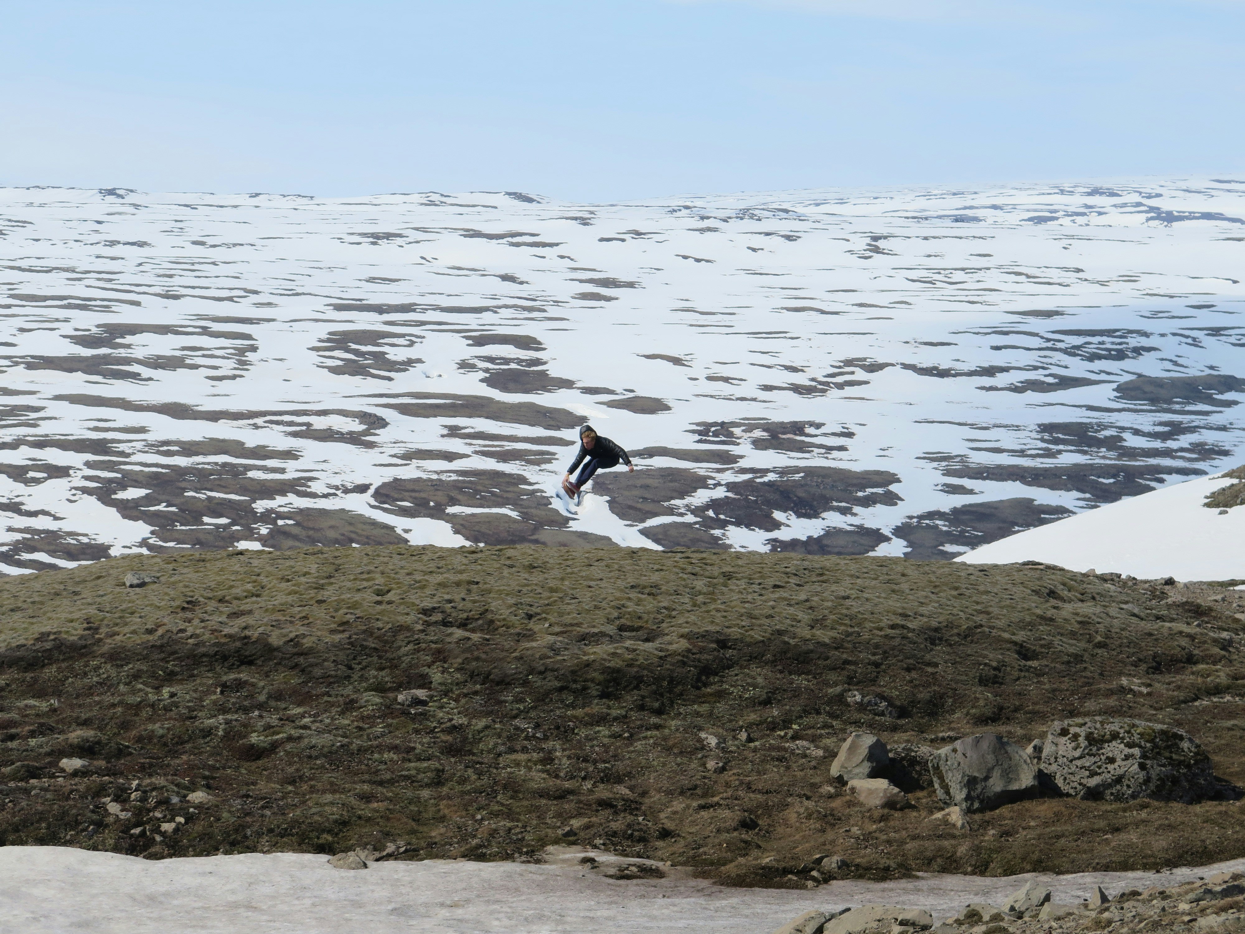 person surfing on waves during daytime